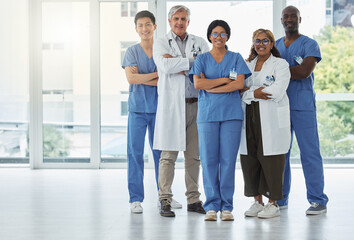 Aufkleber - We use best practice from multiple disciplines. Portrait of a group of medical practitioners standing together with their arms crossed in a hospital.