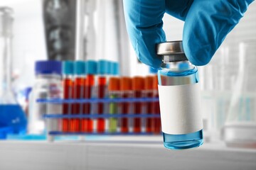 Canvas Print - Bottle of Vaccine in doctor hands in hospital