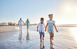 © Kirsten D/peopleimages.com - The best place to be in summer. Shot of a happy family walking together on the beach.
