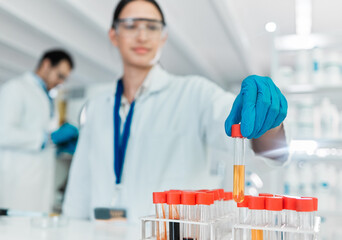Undertaking a new controlled trial. Closeup shot of an unrecognisable scientist working with samples in a lab.