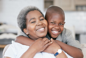 Wall Mural - Family is not an important thing. Its everything. Shot of a boy and his grandma bonding at home.