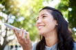 © Clayton Daniels/peopleimages.com - Its easier to say everything she wants in a voice message. Low angle shot of a young businesswoman using a cellphone in the city.
