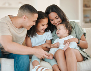 Poster - The man I wanna be, they made me. Shot of a beautiful family bonding on a sofa at home.