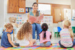 © Nina Lawrenson/peopleimages.com - Everyone loves story time. Shot of a young woman reading to her preschool students.