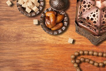 Wall Mural - Plate with dates tasty sweets on wooden desk