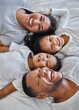 © Kirsten D/peopleimages.com - A happy family is but an earlier heaven. Shot of a beautiful young family bonding in bed together.