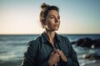 © Hanne Bauer - Portrait of a beautiful young woman on the beach at sunset.