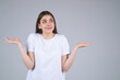 © Volodymyr - Shocked face of woman shouting WOW, isolated on studio background with copy space. Shock content. Girl looks with terrified expression, shocking news. Woman shocked face with open mouth and big eyes.