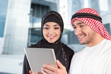 Arab working  wearing traditional clothes on the street