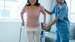© NanSan - Asian Chinese female physiotherapist caregiver helping elderly woman exercise for recovery, prevention of osteoarthritis and osteoporosis.