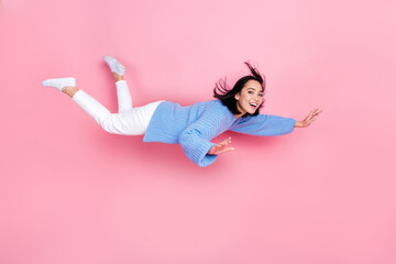 Canvas Print - Full size profile photo of cheerful peaceful girl flying levitate isolated on pink color background