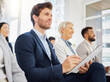 © N Felix/peopleimages.com - Audience, notebook and happy man writing notes of tradeshow speech, seminar presentation or convention event. Trade show attention, conference meeting or business crowd listening in training workshop
