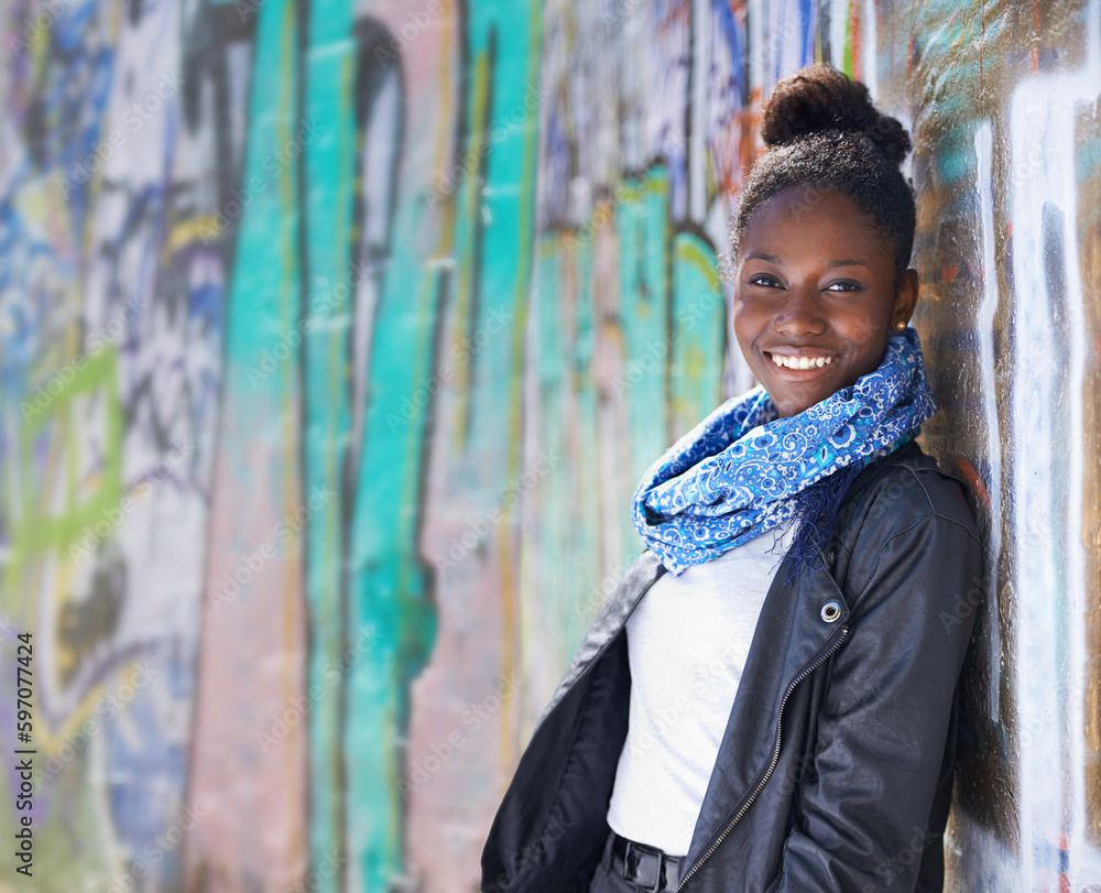 Portrait, urban fashion and black woman at wall with smile, graffiti ...