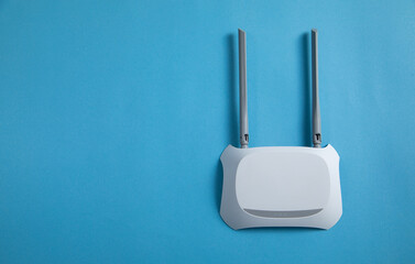 Wall Mural - wi fi router on the blue background.