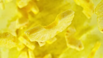 Aufkleber - Super slow motion of rotating pineapple slices, top view. Filmed on high speed cinema camera, 1000 fps, placed on high speed cine bot, following the target. Speed ramp effect.