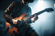© Andrii  - Man playing electric guitar on the stage at the rock concert. Generative AI