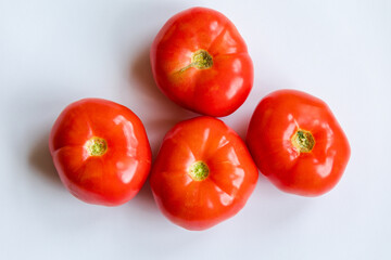 Wall Mural - bunch of red tomatoes close up on white background