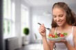 © BillionPhotos.com - Diet concept, young woman eat vegetables salad