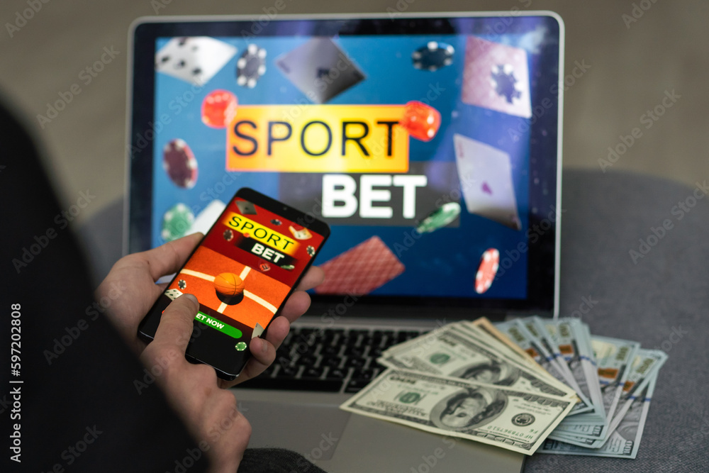 Businessman using smartphone against gambling app screen