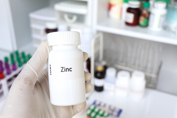 Canvas Print - Zinc pill in white bottle, pill stock