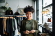 © Trinette Reed - Portrait of Black small business woman owner in clothing retail store. Generative AI.