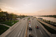 city at evening with buildings and traffic on the road