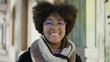 © Krakenimages.com - Young african american woman smiling confident at street