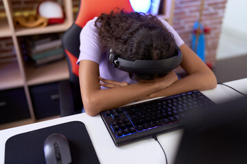 Poster - Young african american woman streamer stressed using computer at gaming room