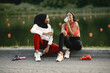 © prostooleh - Two black women drinking a water after doing workout