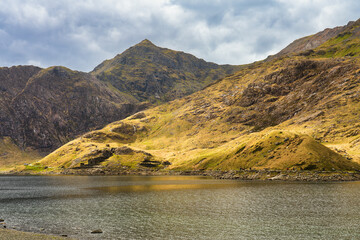 Canvas Print - Old Mine Buildings by Miners Track near Llyn Llydaw lake in Snowdonia. Wales