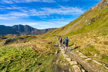 Poster - Hikers on Pyg track at Pen-y Pass in Snowdon. North Wales