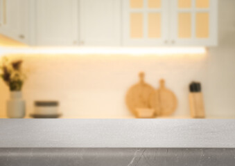 Poster - Empty grey table in beautiful kitchen. Space for design