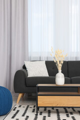 Canvas Print - Stylish living room interior with comfortable furniture and beautiful window curtains