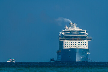 Wall Mural - Cruise ship in the ocean with blue sky.