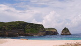 Fototapeta Do akwarium - the charm of the beauty of the white sand and green hills of the Mandalika beach, Lombok, a comfortable place to vacation and relax