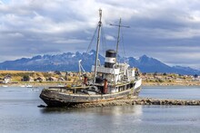 Decommissioned Saint Christopher Old Ship In City Harbour.  Monument To The Shipwrecks Of Region Between Ushuaia, Argentina And Puerto Williams In Chile Across Beagle Channel, Tierra Del Fuego