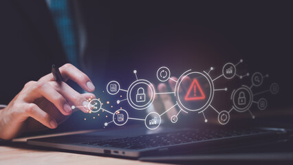 Programmer and virtual icons , exclamation mark ,alarm,computer virus detected ,danger warning concept or information error that should be urgently fixed and repaired ,Notification of security issues