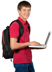 Teen male preppy with a school backpack carrying a laptop