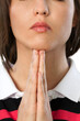 © BillionPhotos.com - Closeup of a Young Woman Praying