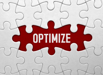 Word OPTIMIZE on red puzzle background