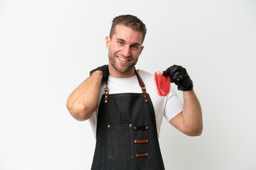 Wall Mural - Butcher caucasian man wearing an apron and serving fresh cut meat isolated on white background laughing