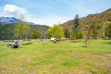 Wall Mural - View of the Levico lake park. Trentino Alto Adige, Italy