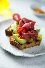 Canvas Print - Avocado toast with smoked ham