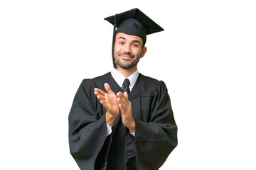 Wall Mural - Young university graduate man over isolated background applauding after presentation in a conference