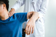 © joyfotoliakid - Physical Doctor consulting with patient About  muscule pain problems Physical therapy diagnosing concept