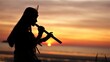 © Alexander - A Native American Indian plays music on a bamboo flute.