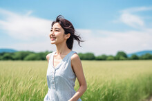 Beautiful Young Japanese Girl In Summer Country Clothes In The Country. The Woman Is Walking Through A Field And Smiling. Happy And Free Female Concept. Generative AI