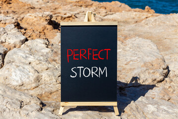 Perfect storm symbol. Concept words Perfect storm on beautiful black chalk blackboard on a beautiful stone background. Business and Perfect storm concept. Copy space.