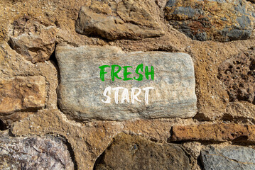 Wall Mural - Fresh start and motivational symbol. Concept words Fresh start on beautiful big grey stone. Beautiful stone wall background. Business motivational Fresh start concept. Copy space.