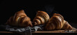 © AL Pires - Detail of croissants with a cloth on the table.
